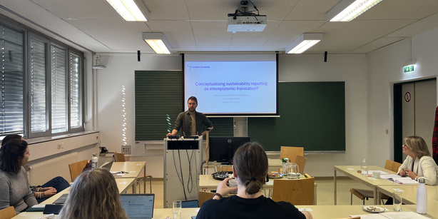 Photo of Riku Haapaniemi presenting at the workshop